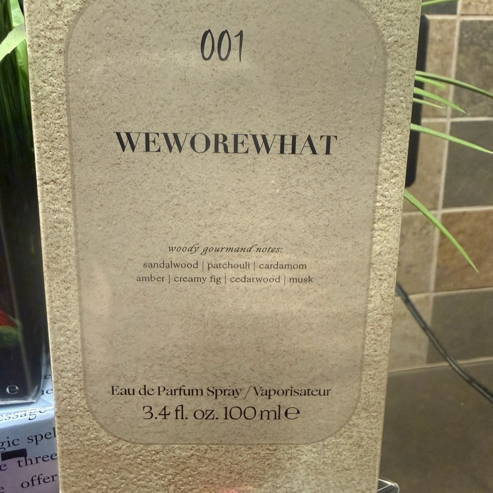WeWoreWhat Fragrance Packaging with Textured Beige Design